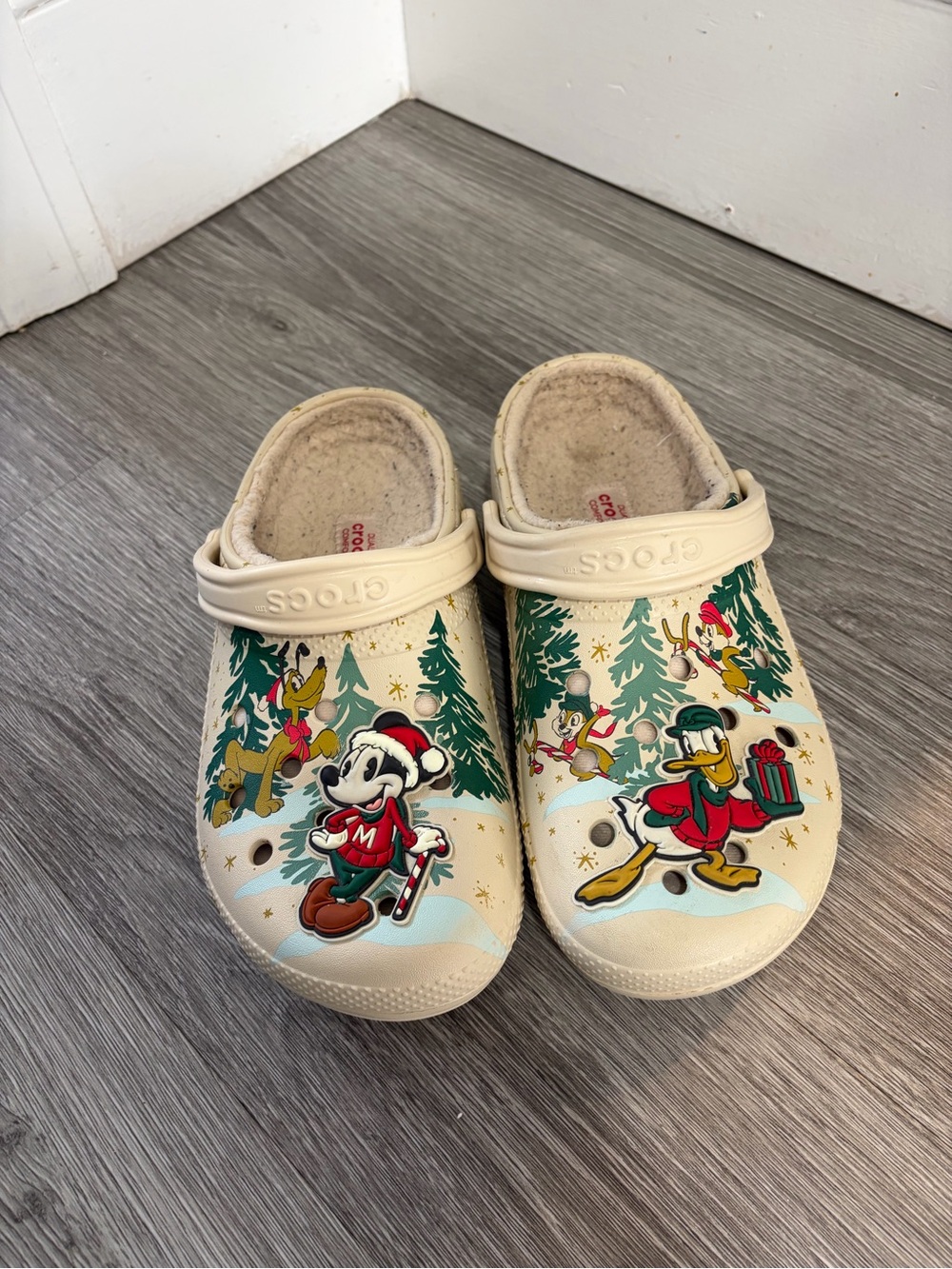 CROCS Cream Holiday Disney Graphic Clogs with Green Trees